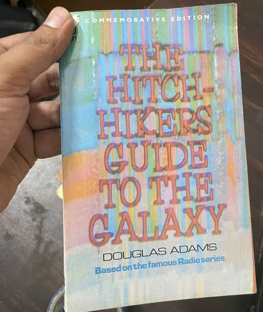The Hitchhiker's Guide to the Galaxy by Douglas Adams
